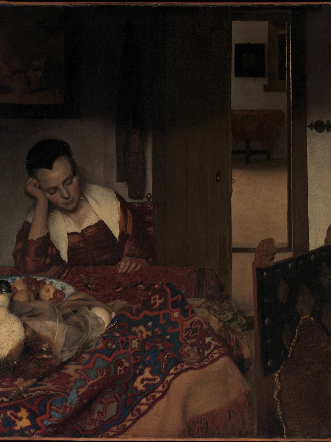 Painting by Vermeer of a young woman asleep at a table, next to a bowl of fruit and a wine jug